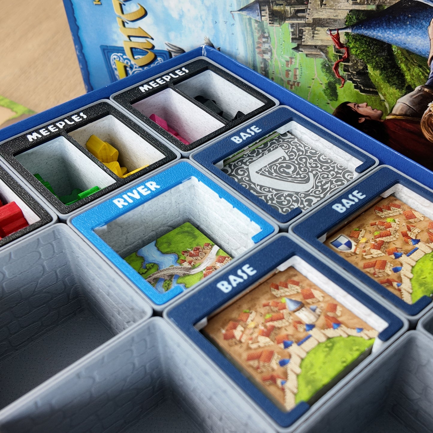 LegendaryMakes Carcassonne Stone & Marble Ruins Gridfinity Organizer – Full set installed in base game box showing marble drop-ins and dark stone bins