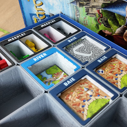 LegendaryMakes Carcassonne Stone & Marble Ruins Gridfinity Organizer – Full set installed in base game box showing marble drop-ins and dark stone bins